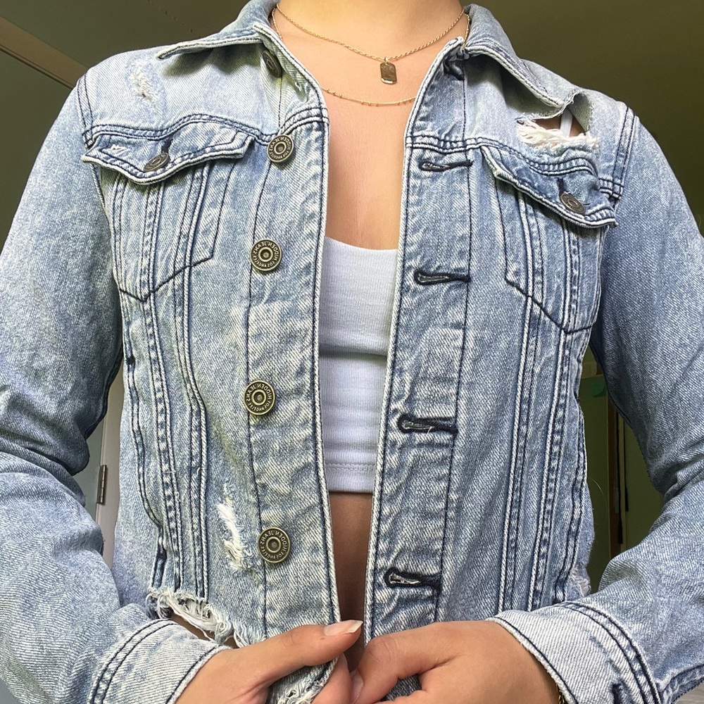 Distressed cropped jean jacket